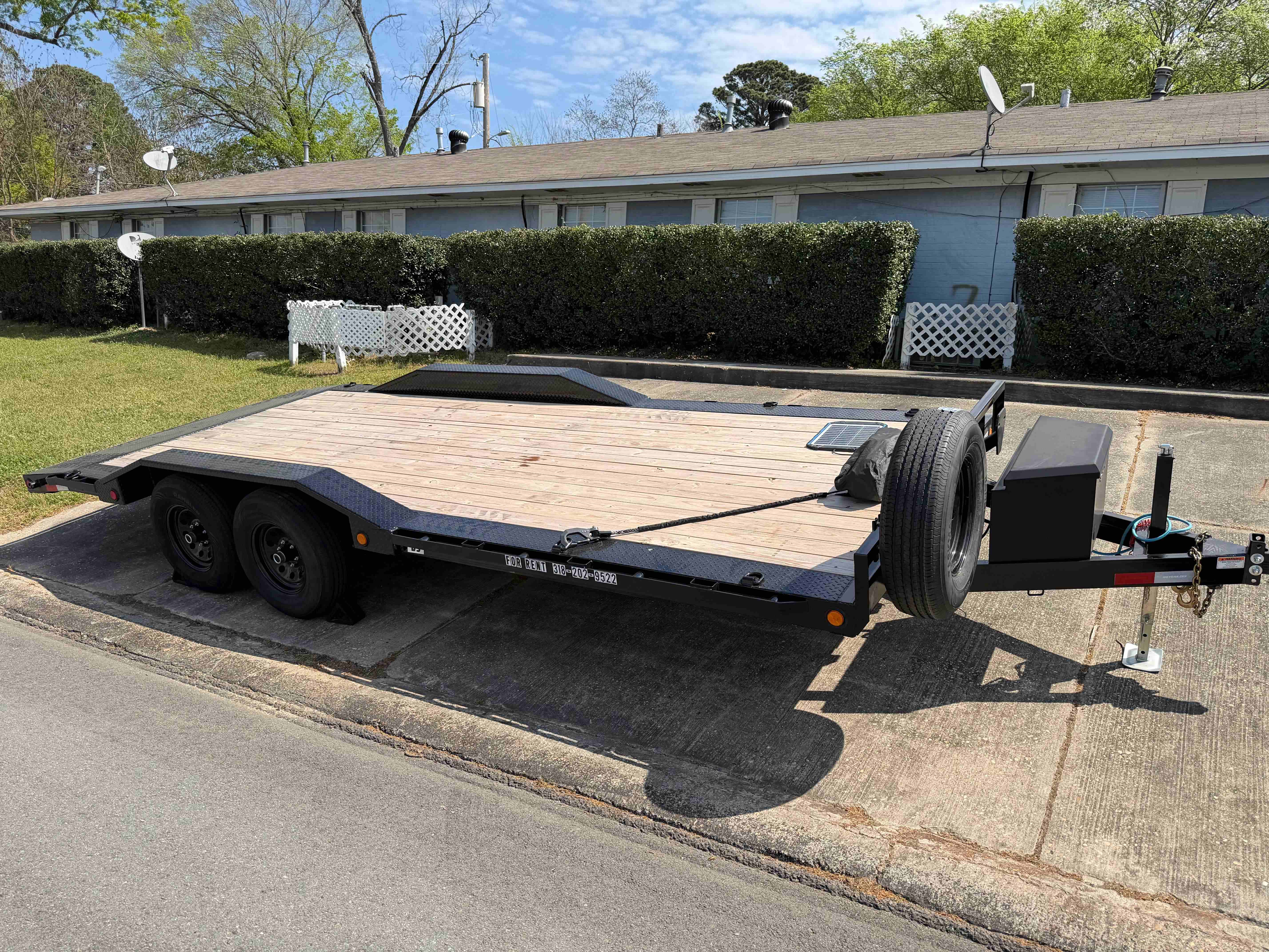 20 foot PJ car hauler trailer with wood deck and ramps available for rent in Ruston, LA